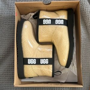 UGG Cream Shearling Boots with Black Accents